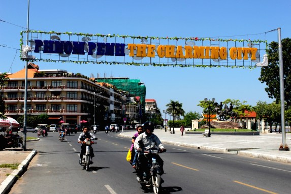 View down Sisowath Quay, proclaiming Phnom Penh's (utterly convincing) creds as a "Charming City".