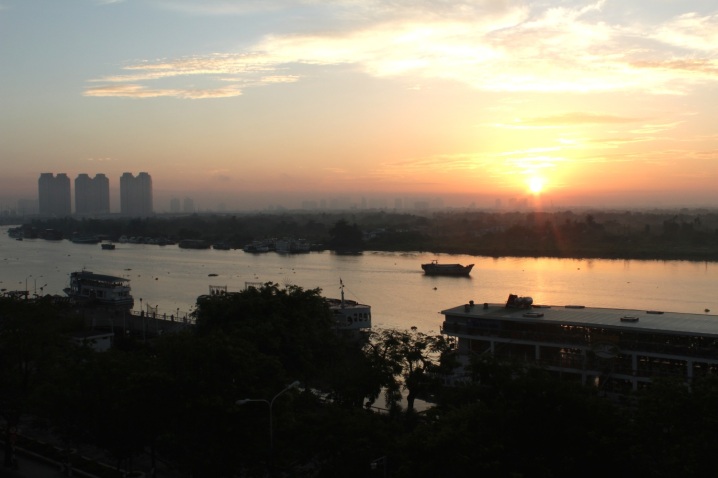 Dawn over the Saigon River - view from my balcony at the Hotel Majestic. 